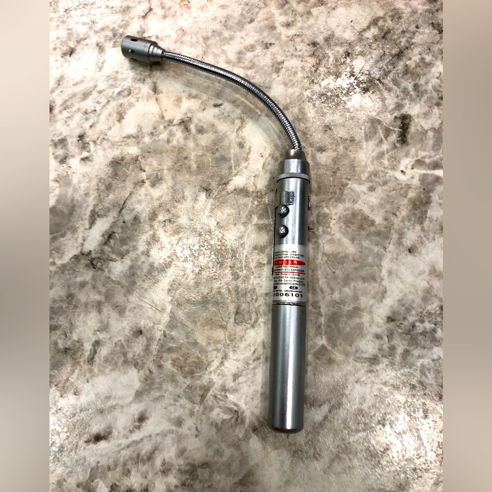 Vintage military pen with laser light, flashlight, a magnet base and working pen